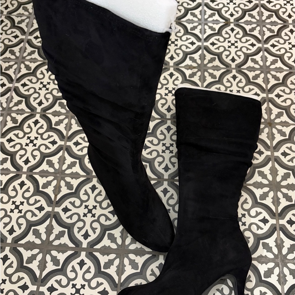 Sold!  Chic Black Knee Boots